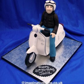 Man riding a Scooter Birthday Cake